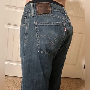 low waisted 2000s Levi’s dark wash jeans
